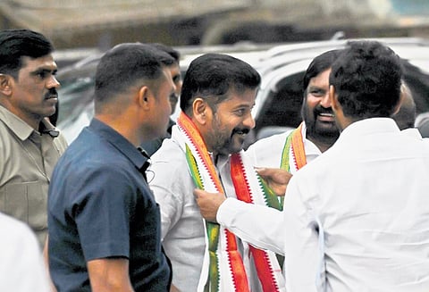 Chief Minister A Revanth Reddy arrives at the Gandhi Bhavan to attend the 
Pradesh Election Committee meeting in Hyderabad on Tuesday 