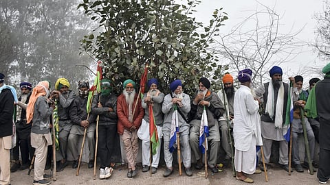 Protesting farmers during their 'Delhi Chalo' march amid fog, near the Punjab-Haryana Shambhu Border, in Patiala district, Wednesday, Feb. 21, 2024.