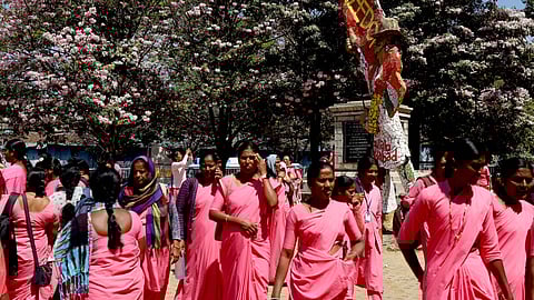 Members of Karnataka Rajya Samyukta Asha Karykarteyara Sangha with support of AIUTUC demand Rs. 15,000 as honorarium and other demands during their protest at Freedom Park in Bengaluru on Tuesday. 