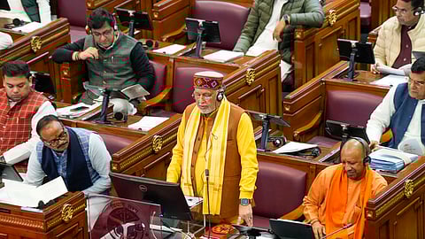 Uttar Pradesh Finance Minister Suresh Kumar Khanna presents the Budget 2024-25 in the state Assembly, in Lucknow. Uttar Pradesh Chief Minister Yogi Adityanath is also seen.