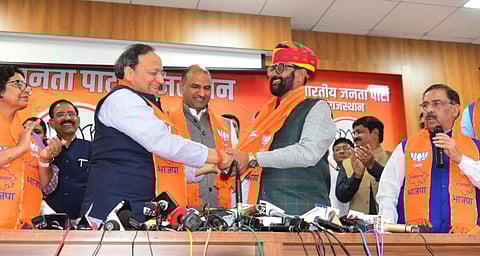 Mahendra Jeet Singh Malviya joining the BJP at the party office in Jaipur in the presence of party president CP Joshi and state party in-charge Arun Singh (Photo | Express)