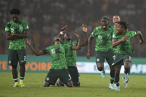 Nigeria's players celebrate winning the penalty shootout during the African Cup of Nations semifinal soccer match between Nigeria and South Africa, Ivory Coast, Feb 7, 2024.