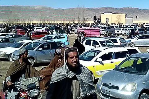 This screen grab from a video taken on February 22 shows Afghan men leaving a football stadium after attending the public execution by Taliban authorities of two men convicted of murder in Ghazni (Photo | AFP)