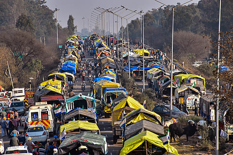 Farmers gather at the Punjab-Haryana Shambhu border during their protest march, in Patiala district.