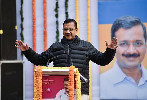 Delhi Chief Minister Arvind Kejriwal addresses the gathering during the inauguration of a school in the Paschim Vihar area of New Delhi on Tuesday.