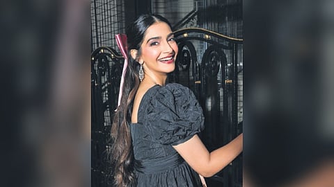 Sonam Kapoor has also been spotted adorning her hair with elegant bow ties, adding a touch of grace and femininity to her overall look.