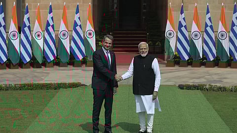 Prime Minister Narendra Modi shakes hands with Prime Minister of Greece Kyriakos Mitsotakis before their meeting at Hyderabad House in New Delhi on Wednesday.