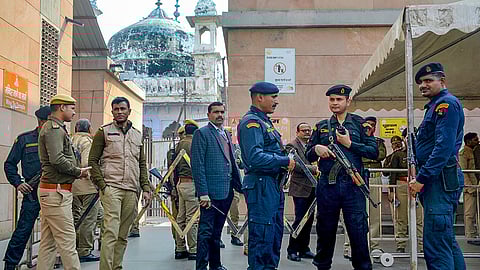 Security personnel stand guard outside the Gyanvapi Mosque, in Varanasi, Thursday, Feb. 1, 2024. 