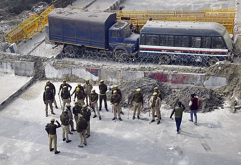 Security personnel deployed at Ghazipur border in view of farmers' 'Delhi Chalo' march, in New Delhi on Wednesday, Feb. 14, 2024.