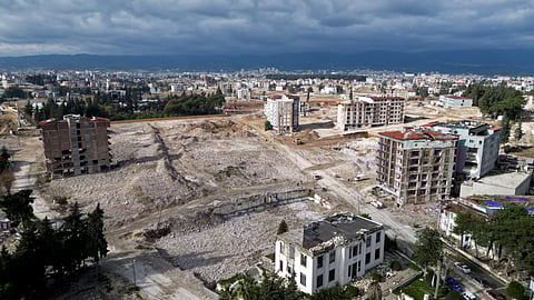 Arial view shows the cleared rubble of buildings destroyed by the Feb. 2023 earthquake in the city of Antakya, southern Turkey, Thursday, Jan. 11, 2024.