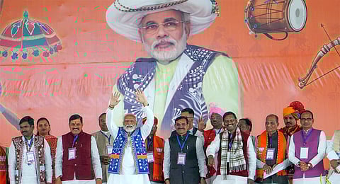 Prime Minister Narendra Modi with Union Tribal Affairs Minister Arjun Munda, Madhya Pradesh Chief Minister Mohan Yadav and others during 'Janjatiya Sammelan' in Jhabua, Madhya Pradesh, Sunday, Feb. 11, 2023. 