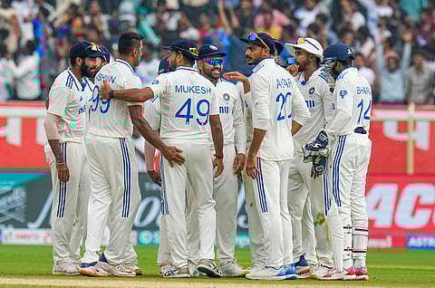 India's bowler Ravichandran Ashwin celebrates with teammates the wicket of England's batter Ollie Pope during the fourth day of the second Test match between India and England on Monday, Feb. 5, 2024.