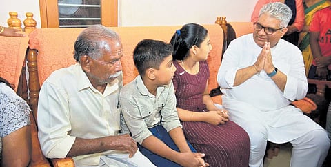 Union Minister Bhupender Yadav at Ajeesh’s residence in Wayanad.