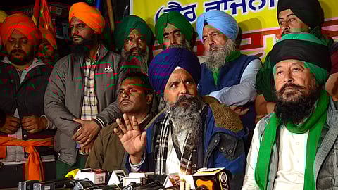 Farmer leader Sarwan Singh Pandher with others addresses the media during the ongoing farmers protest over various demands, including a legal guarantee of minimum support price (MSP) for crops, at the Punjab-Haryana Shambhu Border.