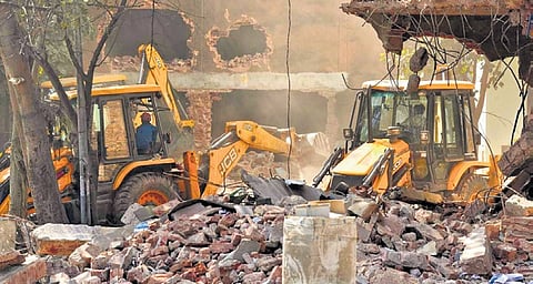 The demolition drive carried out by the Delhi Forest Department to clear the encroached villages.