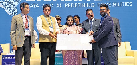 Governor Tamilisai Soundararajan felicitates a startup recognised by the Telangana government during BioAsia 2024 in Hyderabad on Wednesday 