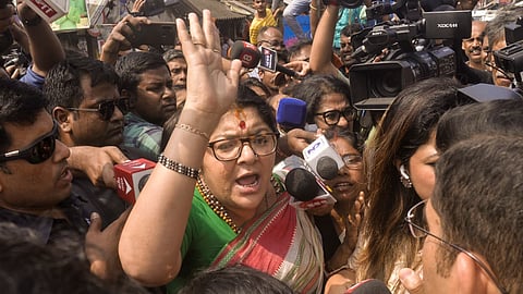 BJP MP Locket Chatterjee with other BJP Mahila Morcha members talks to the media while heading towards Sandeshkhali, in Kolkata, Friday, Feb. 23, 2024.