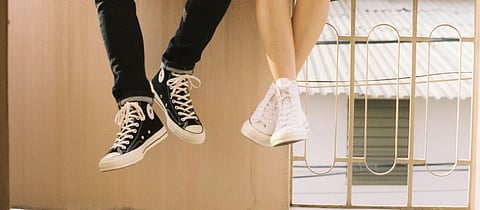 Image of people wearing shoes used for representational purposes only