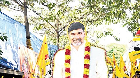 Former MLC Buddha Venkanna anoints TDP chief N Chandrababu Naidu’s cutout with his blood on Sunday.