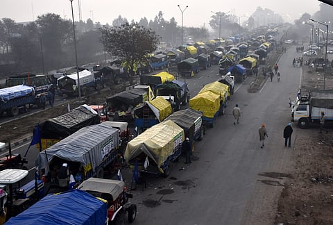 Tractor trolleys parked at Punjab-Haryana Shambhu border as farmers continue their 'Delhi Chalo' march, near Patiala, Wednesday, Feb. 14, 2024. 