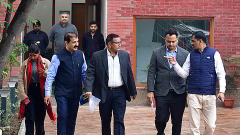 Delhi Police Crime Branch officials at the residence of Delhi minister Atishi Singh to serve her a notice regarding investigation into AAP's claim that the BJP was trying to poach its MLAs, in New Delhi. 