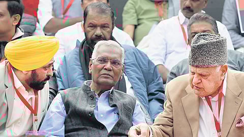 Jammu and Kashmir National Conference president Farooq Abdullah, CPI general secretary D Raja and Punjab CM Bhagwat Maan during LDF protest against Centre in New Delhi on Thursday.