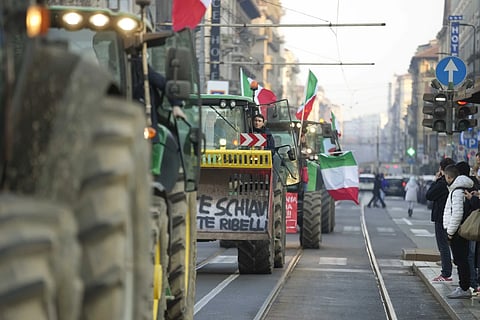 Farmers run their tractors in Milan, Italy, Thursday, Feb 1, 2024.