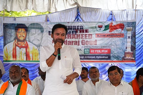 BJP state president G Kishan Reddy addresses a meeting at Ratnanagar 
basti in Nallakunta, Hyderabad on Friday 