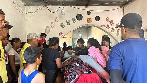 Relatives mourn one of the miners that died after the collapse of a remote illegal mine, in La Paragua, Bolivar state, Venezuela.