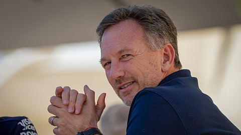 Red Bull team principal Christian Horner sits in the paddock during Formula One pre-season testing at the Bahrain International Circuit in Sakhir, Bahrain, Wednesday, Feb. 21, 2024.