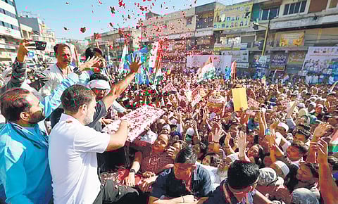 Rahul Gandhi with supporters in Dahod on Friday. | pti