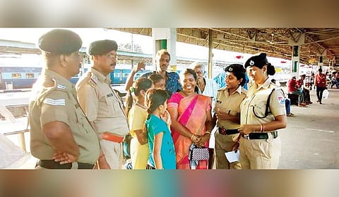 Representational pic of Railway Protection Force cops interacting with women passengers.