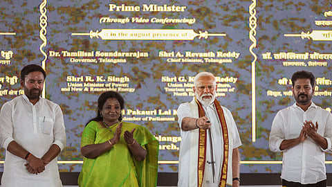 Prime Minister Narendra Modi during the launch of development initiatives, in Adilabad.Telangana Governor Tamilisai Soundararajan, Chief Minister A Revanth Reddy and Union Minister G Kishan Reddy are also seen