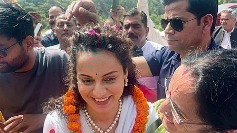 Congress MP Rahul Gandhi (L) BJP MP Kangana Ranaut