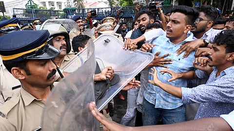 Police and KSU activists clash with each other during the latter’s protest march in Thiruvananthapuram on Friday.