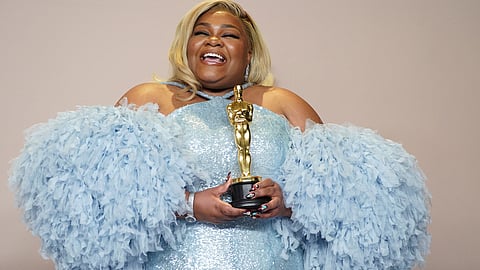 Da'Vine Joy Randolph poses in the press room with the award for best performance by an actress in a supporting role for "The Holdovers" at the Oscars on Sunday, March 10, 2024.
