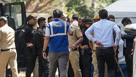 Security personnel stand guard at the Rameshwaram cafe blast site, in Bengaluru