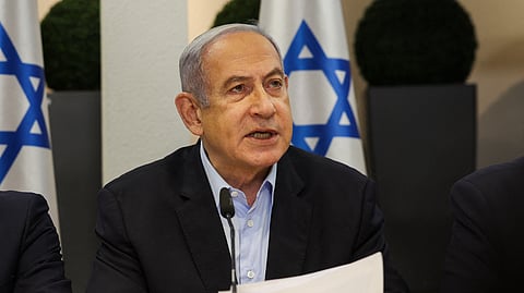 Israeli Prime Minister Benjamin Netanyahu heads the weekly cabinet meeting at the Defence Ministry in Tel Aviv on January 7, 2024.