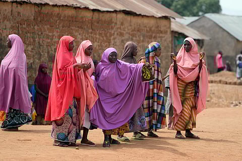 Parents wait for news about the kidnapped LEA Primary and Secondary School Kuriga students in Kuriga, Kaduna, Nigeria, Saturday, March 9, 2024.
