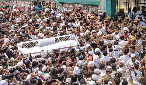 People gather during the funeral procession of gangster-turned-politician Mukhtar Ansari, in Ghazipur, Saturday, March 30, 2024.