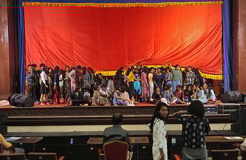 Students of Government College for Women and University College hold a demonstration on the stage alleging favouritism in the results of folk music, thiruvathira and margamkali competitions that were declared on Monday.