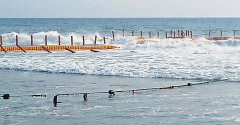 The damaged floating bridge at the Varkala Papanasam beach