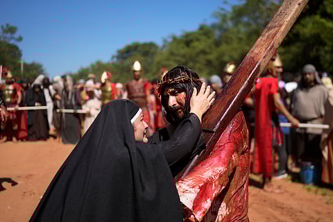 Actors perform in a Way of the Cross reenactment as part of Holy Week celebrations, in Atyra, Paraguay, Friday, March 29, 2024. 