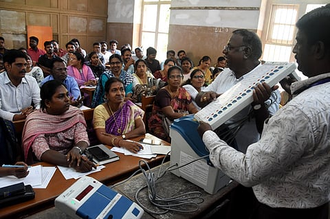 Election officers giving instruction to the government staffs for the upcoming Lok Sabha election polling in Tamil Nadu