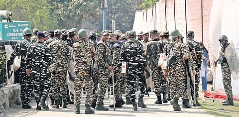 (Left) Heavy traffic conjestion on NH-24 due to restrictions in view of the ‘Kisan Mazdoor Mahapanchayat’ at the Ramlila Maidan on Thursday. (Right) Security personnel deployed in central Delhi