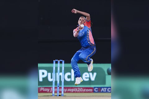 Mumbai Indians' Shabnim Ismail bowls during the Women's Premier League (WPL) 2024 cricket match between Delhi Capitals and Mumbai Indians on Tuesday, March 5, 2024.