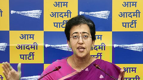 Delhi Minister and AAP leader Atishi addresses at a press conference at the party office, in New Delhi.