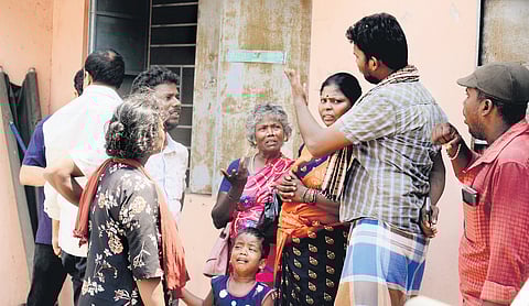 Family members of Cyclone Raj near Royapettah Hospital mortuary on Friday 