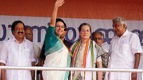 UDF Candidate Padmaja Venugopal waves to party workers in Thrissur constituency during the 2016 Kerala Assembly elections, alongside former Congress President Sonia Gandhi and then Kerala Chief Minister Oommen Chandy, and Senior Congress leader Ramesh Chennithala.