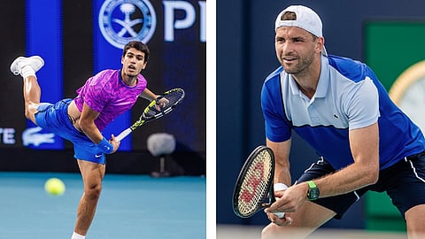 Carlos Alcaraz (L) and Grigor Dimitrov during their Miami Open quarter-finals on Thursday.